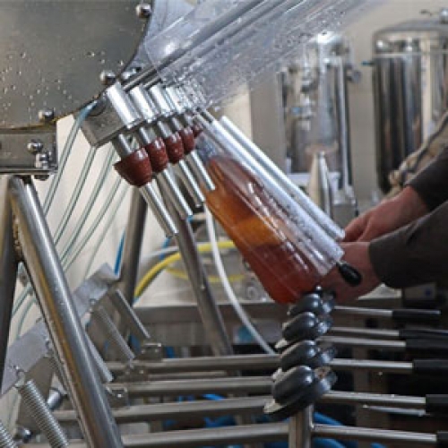 PET bottle filling with isobaric system